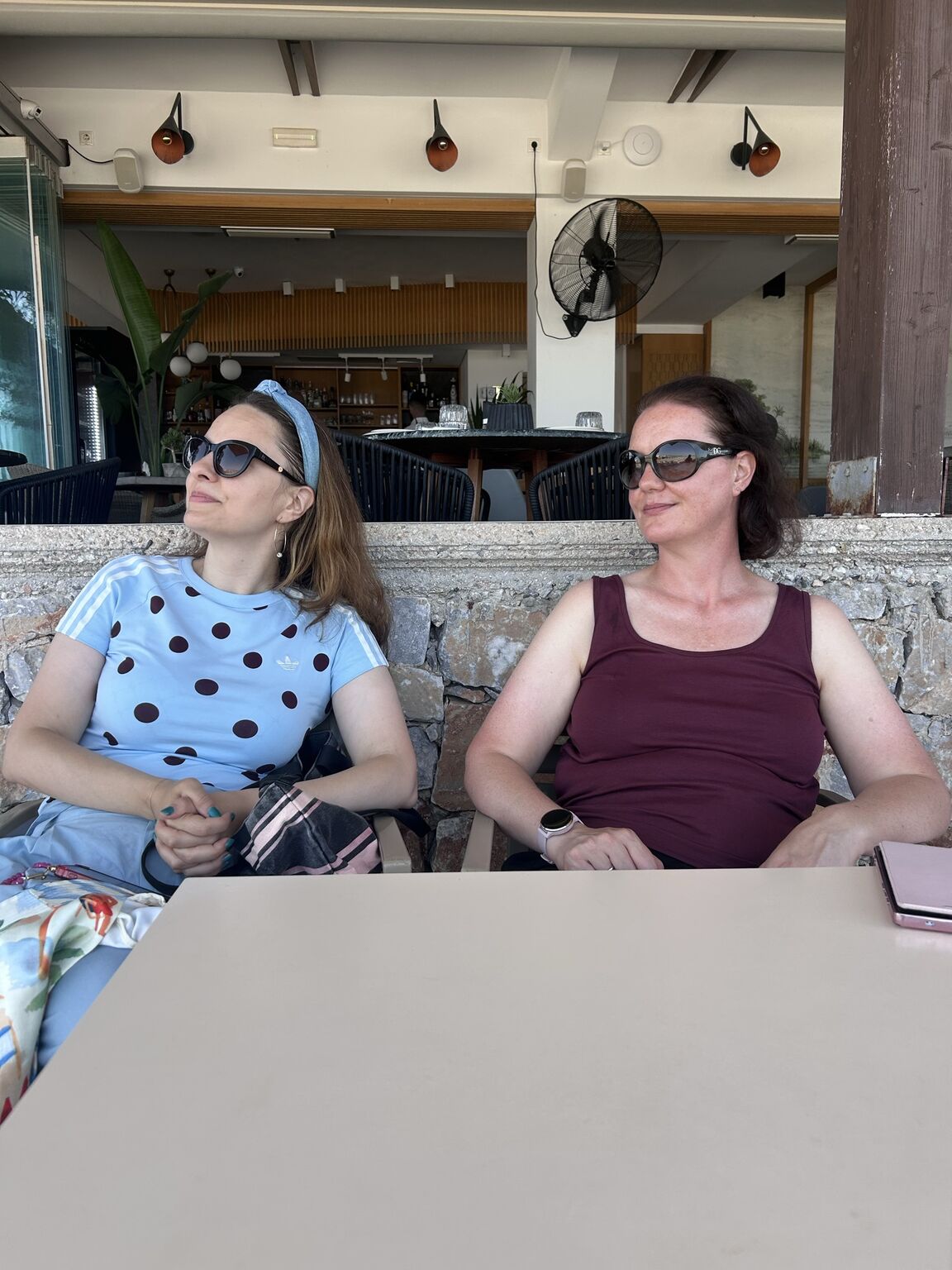 Ana-Maria Mihalceanu and Marit van Dijk at Mylos beach bar.